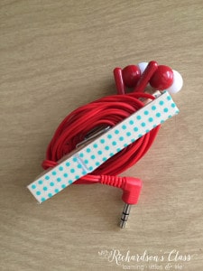 Use clothespins to hold earbuds for little hands in the classroom